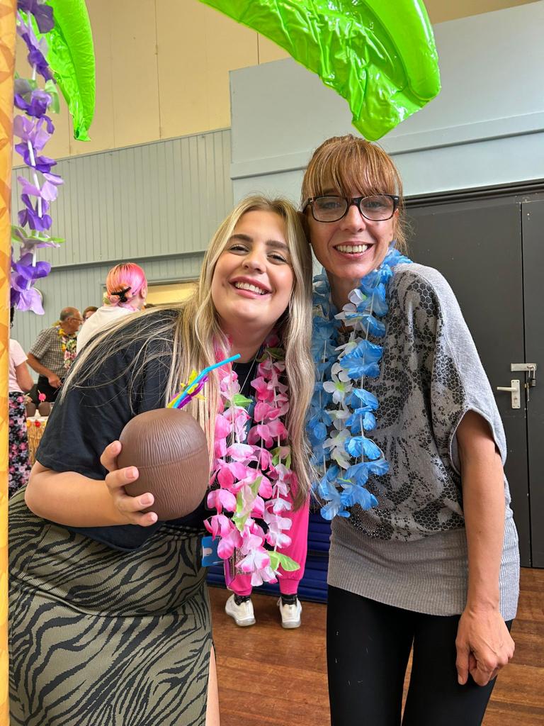 Lauren and Lisa at shard end community centre Hawaii luncheon