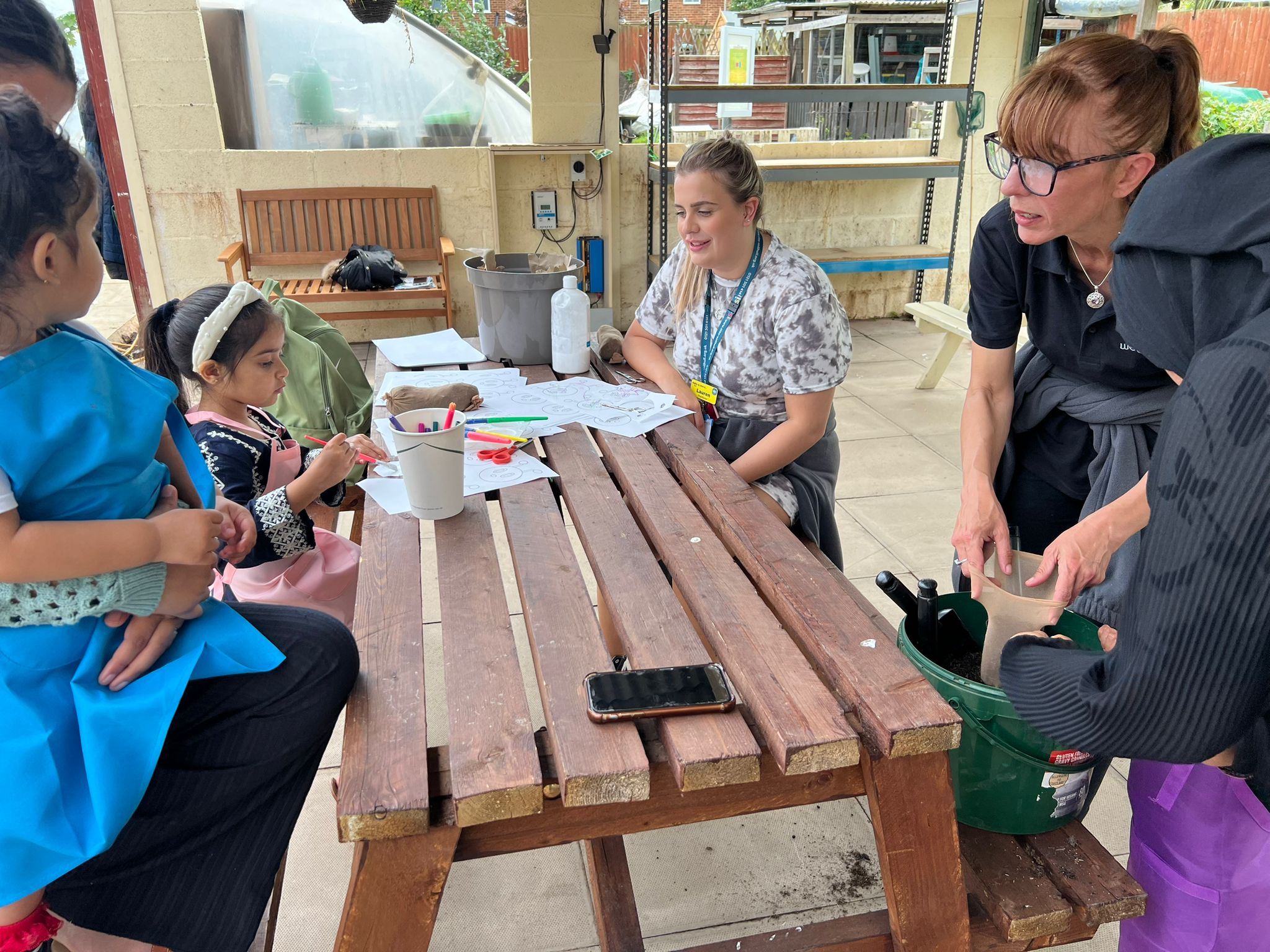 soil to boil group cooking at tile end community garden