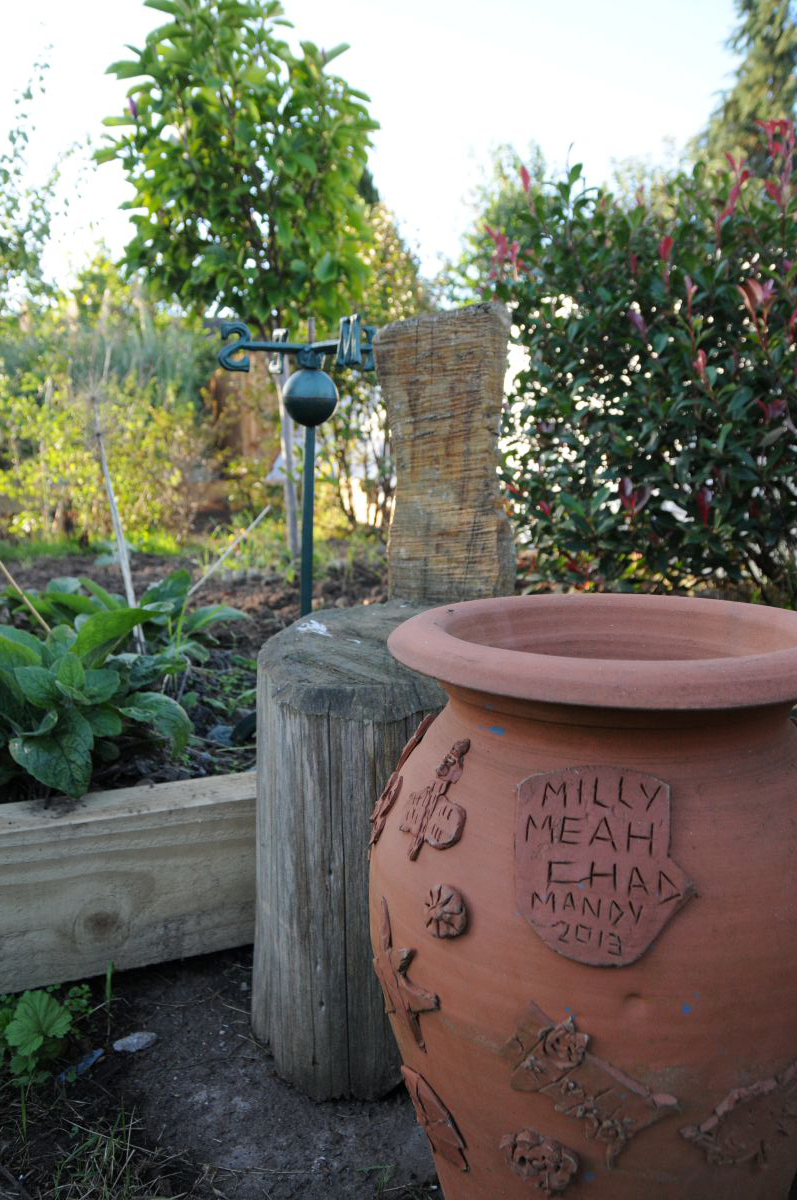 handmade decorations at tile cross community garden