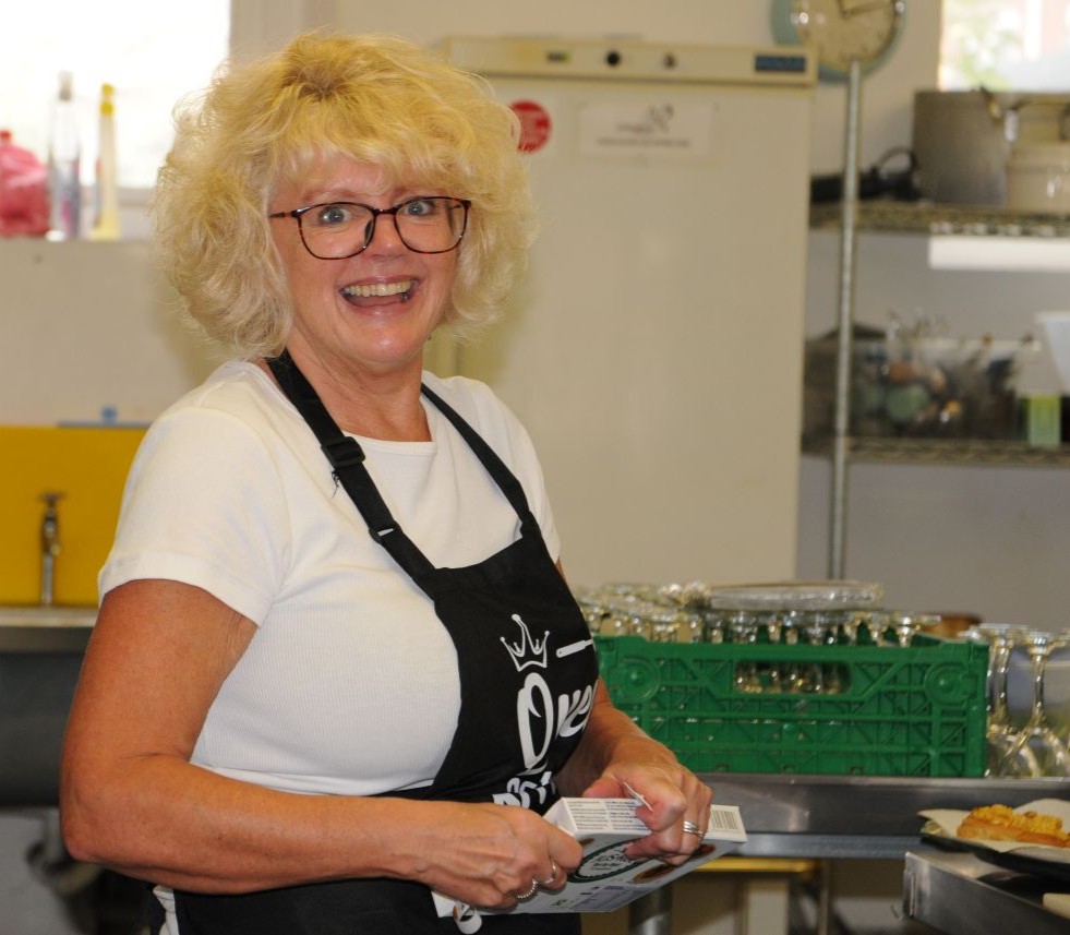 sue serving lunch at shard end community centre